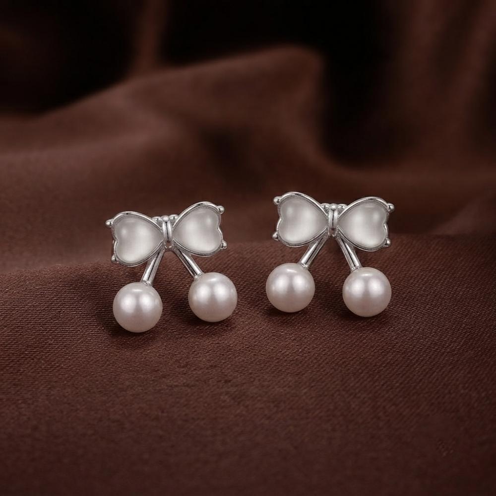 JewelMaze Silver Plated Bow Shape Austrian Stone & Pearl Stud Earrings for Women 