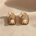 JewelMaze Gold Plated Butterfly Motif Austrian Stone & Pearl Stud Earrings for Women 